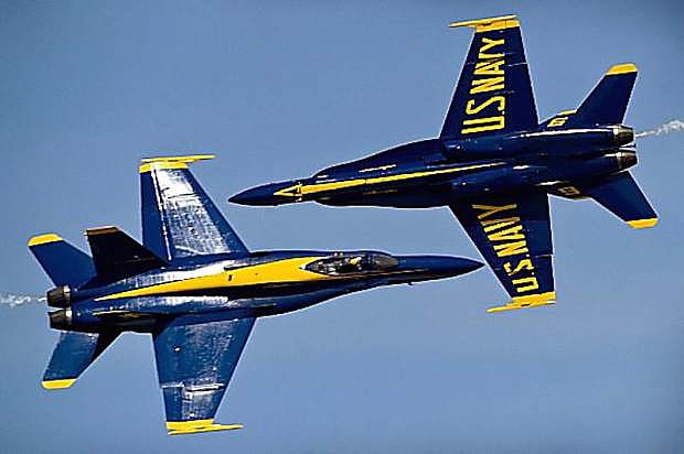 The U.S. Navy fight demonstration squadron, the Blue Angels, demonstrate choreographed flight skills during the annual Joint Service Open House.