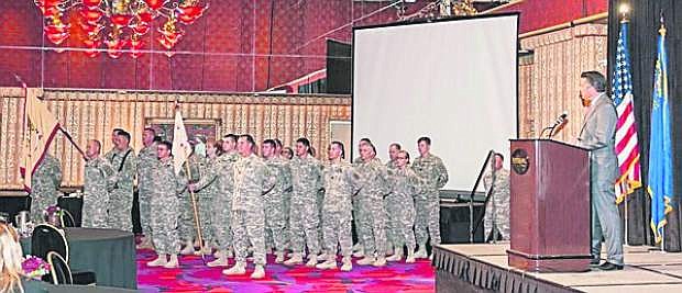 Soldiers of the 757th Combat Sustainment Support Battalion stand in formation during a Yellow Ribbon Program welcome home ceremony held at the Peppermill Hotel and Casino where Gov. Brian Sandoval and other dignitaries thanked the troops and their families for their sacrifice and service.