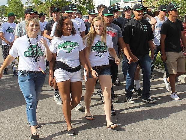 The city of Fallon honored the state champion Greenwave softball and baseball teams with a parade Thursday down Maine Street.