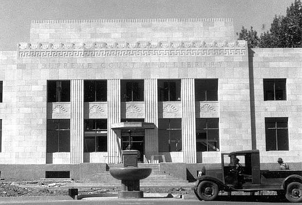 The Supreme Court and State Library building under construction in 1937. The fountain in front was donated to Carson City in 1909 and used to water animals at the intersection of Carson and King streets.