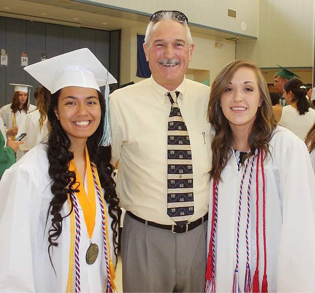 Michelle Therianos, left, who will attend the U.S. Naval Academy&#039;s prep school, stands with her former instructor, Donn Sheldon, and  Emily Scott.