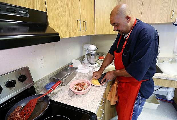 Jose Garcia works in a culinary class at Warm Springs Correctional Center in Carson City, Nev., on Wednesday, May 25, 2016. Inmates receive education and training in different areas through programs sponsored by the Carson City School District.