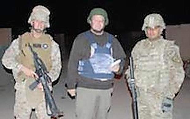 LVN Editor Steve Ranson, center, visited a security detail on the outer edges of Kandahar Air Field in November 2011.