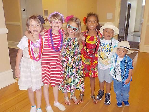 Students dress up for last weekend&#039;s luau dance. From left are Sophie Bake, Leah Bake, Meirra Cavanaugh, Sylea Sanders, Shraja Sanders and Shedaveon Sanders.