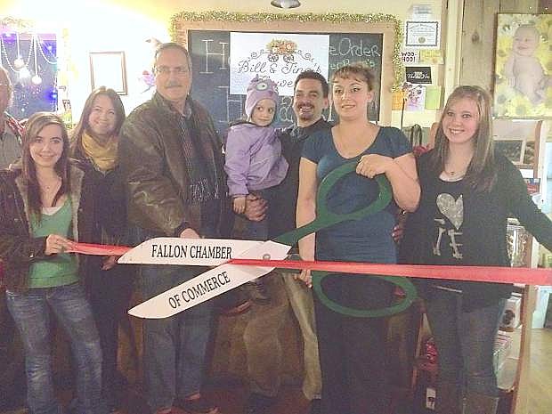 Bill and Tina&#039;s Florists held a ribbon cutting for their store. From left are Amber Mello, Natalie Parrish, Mayor Ken Tedford Jr., Kaydence Burts, Bili Burts, Tina Arata and Michelle Jarschke.