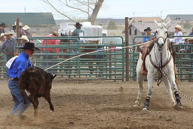 Jess Tews of Fallon competes in tie-down roping at the Fernley High School Rodeo.