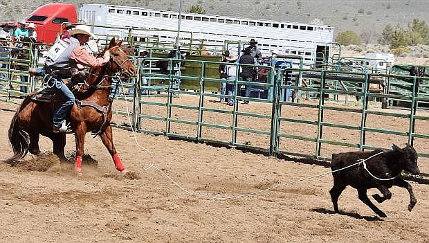Sam Goings competes in tie-down roping at a recent high-school rodeo.