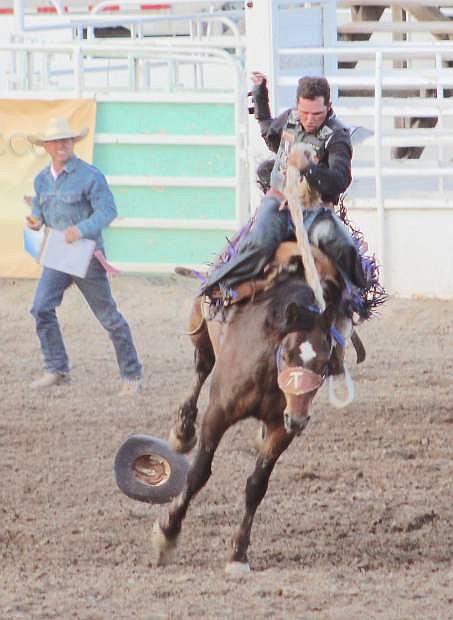 Cord Hendrix tries for a good score in saddle bronc at a previous rodeo.