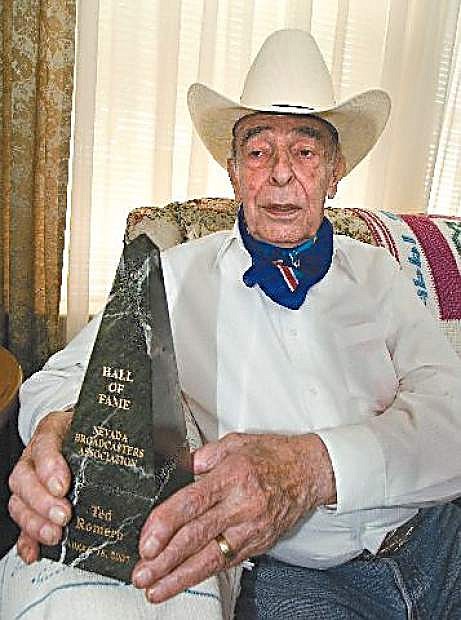 In this file photo taken by Kim Lamb, Ted Romero shows his Hall of Fame trophy presented to him in 2007 by the Nevada Broadcasters Association.
