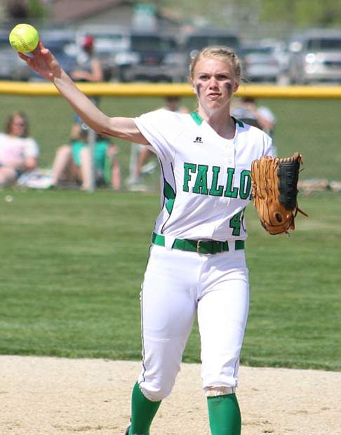 Kalyn Huckaby makes a throw in a previous Lady Wave softball game.