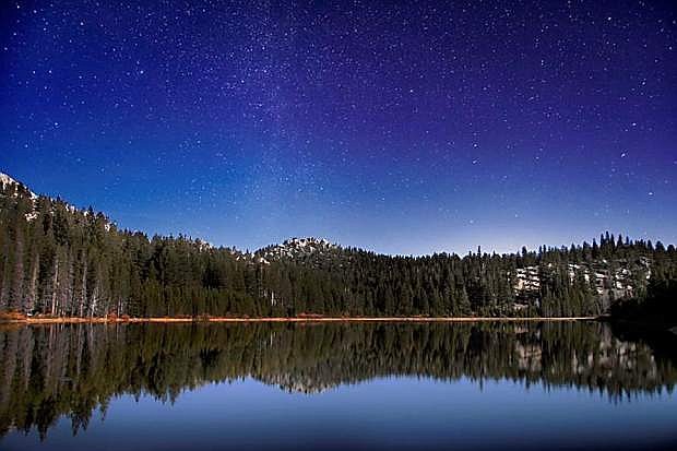 Stars shine above Spooner Lake.