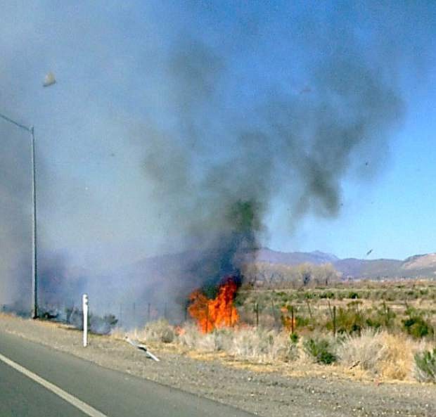 Highway 395 was closed after flames threatened the main route between Minden and Carson City.