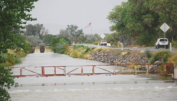 Rain pounded one of the irrigation canals north of Fallon Sunday when .16 inch of preciptation fell in the area.