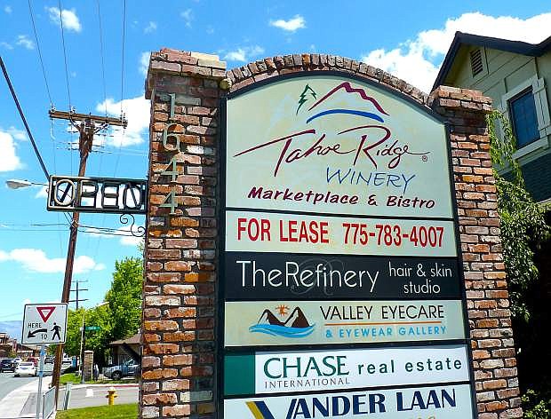 The open sign next to the Tahoe Ridge Winery and Bistro in Minden remains dark after the restaurant closed on Sunday.