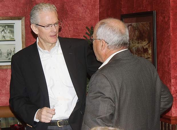 Eric Kreutzberg, left, regional manager for industrial development, marketing and sales for Union Pacific Railroad, speaks with Churchill County Commissioner Bus Scharmann after Wednesday&#039;s Churchill Economic Development Authority breakfast.