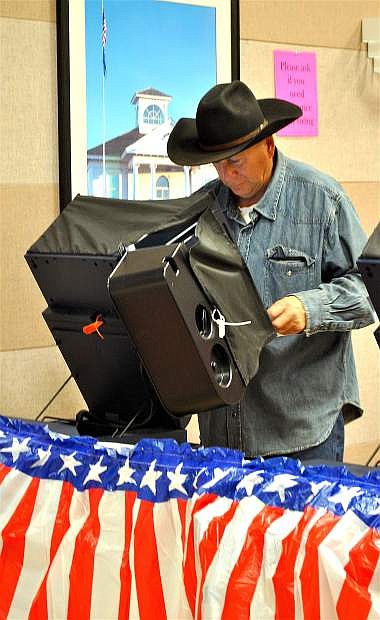 Tom Tijerino votes early on Monday afternoon, having brought his notated sample ballot with him to the Churchill County Commission Chambers. About 1,400 voters had shown up since early voting opened Saturday, said Deputy Clerk Erin Montalvo.