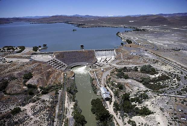 This aerial photos shows Lahontan Dam, the reservoir and the Carson River.