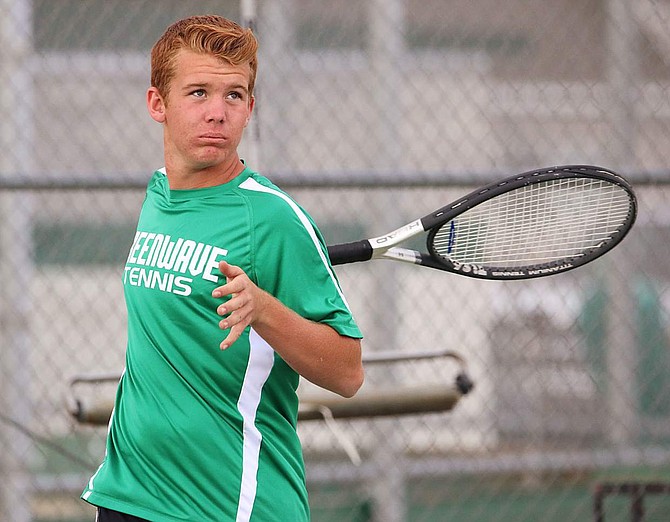 Myles Getto, Fallon&#039;s No. 1 singles player, follows through on a backhand in Monday&#039;s practice.