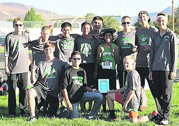 The boys cross country team takes the First Place Small School Division award in the Small School Division at the Reed Invitational Meet at Shadow Mountain on Friday. PHOTO COURTESY OF SUMMER THOMSON