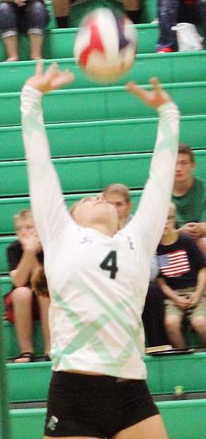 Zoey Swisher sets the ball for the Lady Wave.