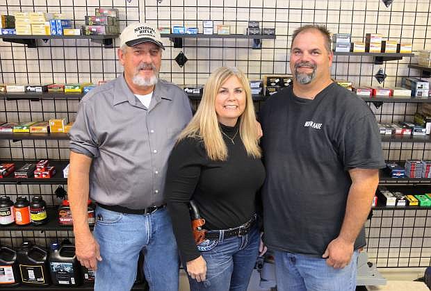 Jim Scott, left, and his wife Kristy have become business partners with Rudy Hindelang, owner of Battle Born Ammunitions &amp; Firearms.