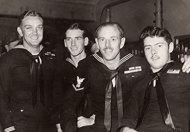 Jack Wolfe is the third handsome sailor from the left relaxing with three of his shipmates in the Pacific Theatre of Operations during World War II.