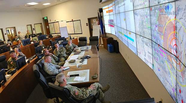 Nevada Army National Guard staff convene in the Emergency Operations Center in a simulated post-earthquake relief effort.