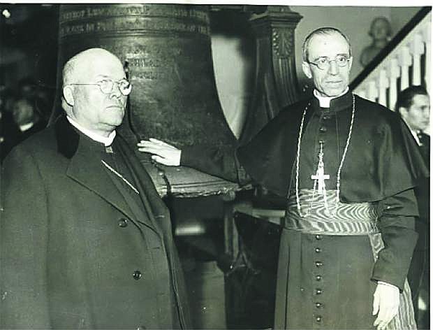 Eugenio Cardinal Pacelli (right, the future Pope Pius XII), with Cardinal Dougherty, visiting the Liberty Bell in Philadelphia during his United States Tour in 1936, which included Boulder City and Hoover Dam in Nevada.