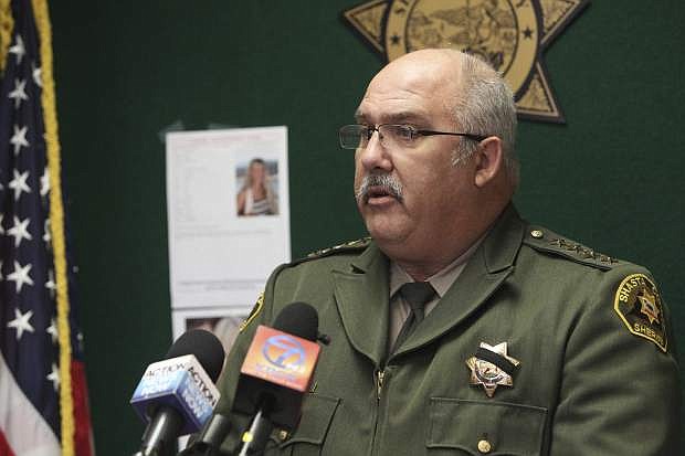 In this Thursday, Nov. 24, 2016 photo, Shasta County, Calif., Sheriff Tom Bosenko addresses the media during a press conference regarding a missing woman who was found, in Yolo County, Calif. Authorities were searching Thursday for two women suspected in the abduction of Sherri Papini a California mother who turned up safe near an interstate three weeks after she disappeared.  (Andreas Fuhrmann  /The Record Searchlight via AP)