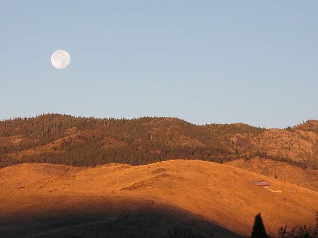 David Knighton caught the super moon looming over C Hill Tuesday morning.