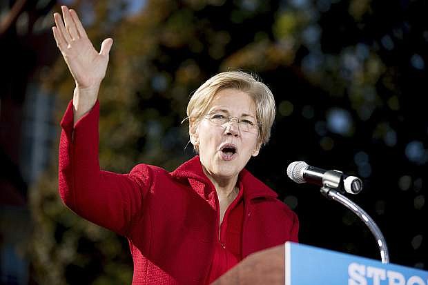 Sen. Elizabeth Warren, D-Mass. speaks at a rally for Democratic presidential candidate Hillary Clinton at St. Anselm College in Manchester, N.H., Monday, Oct. 24, 2016. (AP Photo/Andrew Harnik)