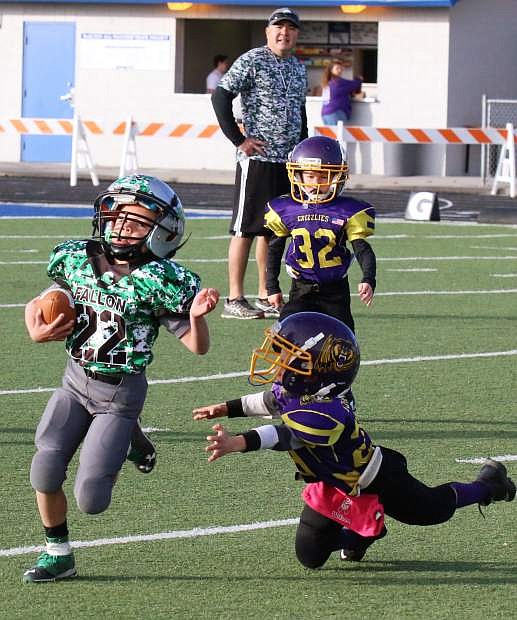 Fallon&#039;s Maxton Richardson eludes a Lassen defender in the team&#039;s SYFL championship game on Saturday.