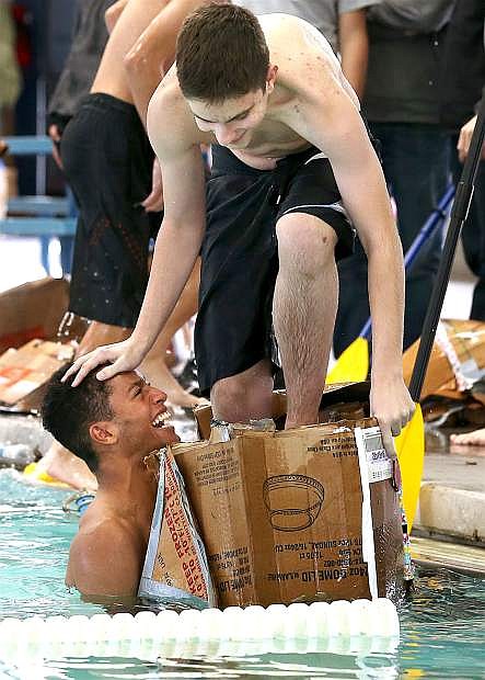 Carson High School NJROTC students compete in a cardboard vessel competition at the Aquatics Facility in Carson City on Wednesday.