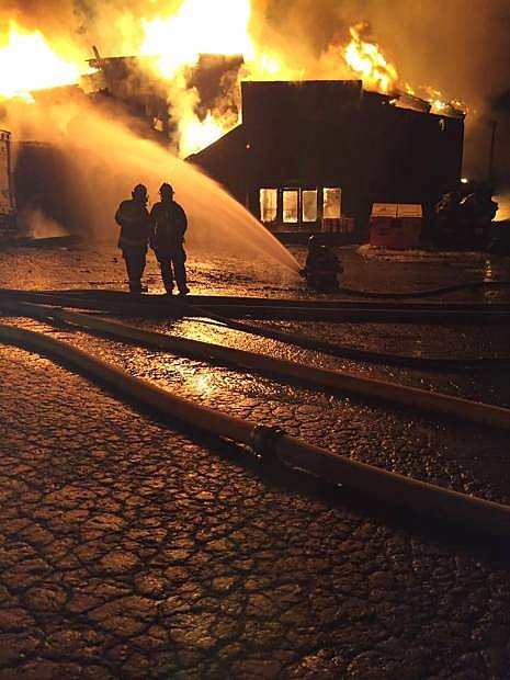Fire crews battle the blaze during the early morning hours Wednesday.