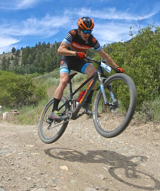A Kona pro rider gets air off a waterbar coming down King&#039;s Canyon while pre-riding the race course Saturday.