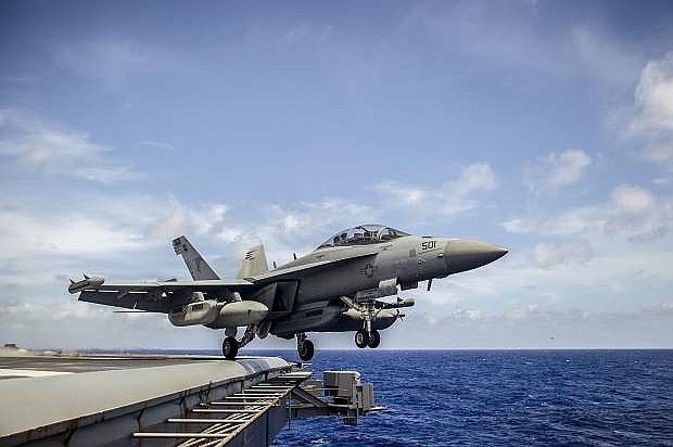 150801-N-EH855-316 WATERS NEAR HAWAII (Aug. 1, 2015) An E/A-18G Growler from the Shadowhawks of Electronic Attack Squadron (VAQ) 141 launches from the flight deck of the Nimitz-class aircraft carrier USS George Washington (CVN 73). George Washington and its embarked air wing, Carrier Air Wing (CVW) 5, are en route to conduct a hull-swap with the Nimitz-class aircraft carrier USS Ronald Reagan (CVN 76) after serving seven years as the U.S. Navy&#039;s only forward-deployed aircraft carrier USS George Washington in Yokosuka, Japan. (U.S. Navy photo by Mass Communication Specialist 3rd Class Bryan Mai/Released)