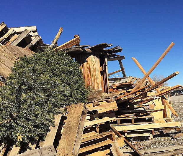 Discarded Christmas trees, wood pallets and and other items are being retired at Churchill County Fairgrounds, where tomorrow evening&#039;s community bonfire, fireworks and raffle will occur.