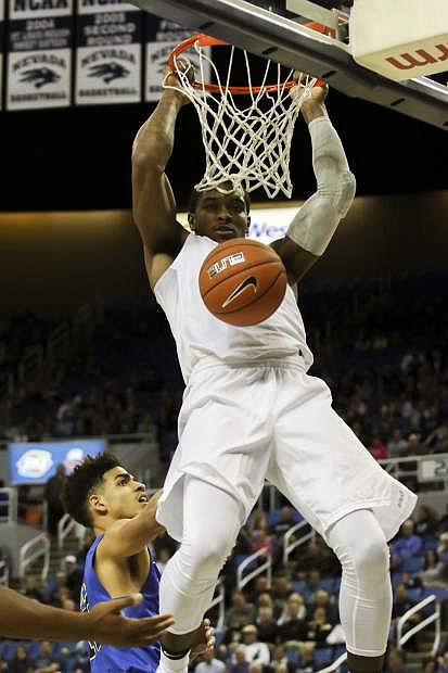 Nevada&#039;s Cameron Oliver dunks against San Jose State on Wednesday.