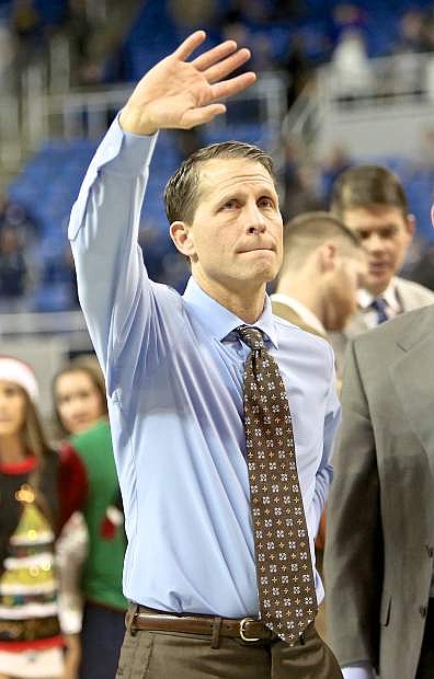 Coach Eric Musselman acknowledges the crowd following the Pack&#039;s win against Irvine Wednesday.