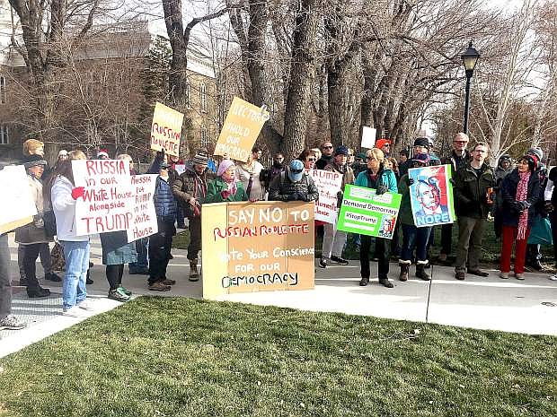A group of about 40 protesters gathered outside the Capitol Monday morning just hours ahead of the electoral college vote in Nevada.