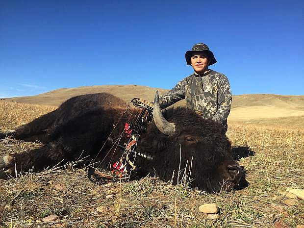 John Rupert, 15, killed a buffalo this year using a bow and arrow on the Blackfeet Indian Reservation in Browning, MT.