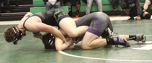Matt Goings goes for a pin on Spanish Springs&#039; Logan Klonicke during a match in Saturday&#039;s tournament.