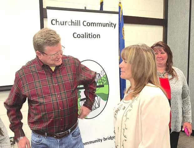 Congressman Mark Amodei talks to Andrea Zeller, executive director of the Churchill Community Coaliton, after the group&#039;s quarterly luncheon before Christmas.