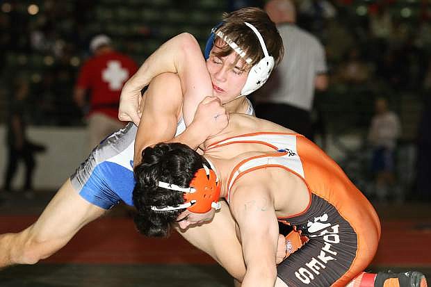 Carson&#039;s Kyle Rudy scores a technical fall over Woodland&#039;s Zach Robles of the 132-pound weight class at the Sierra Nevada Classic in Reno on Wednesday.