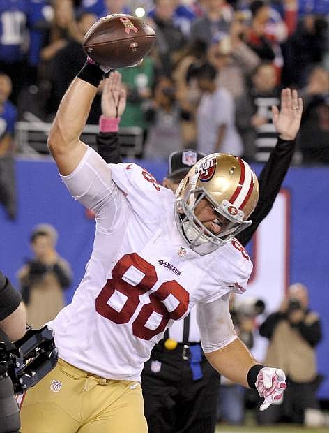 San Francisco 49ers tight end Garrett Celek (88) reacts after scoring a touchdown against the New York Giants during the fourth quarter of an NFL football game, Sunday, Oct. 11, 2015, in East Rutherford, N.J. (AP Photo/Bill Kostroun)