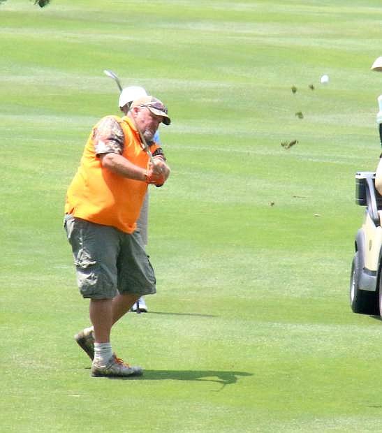 Comedian Larry The Cable Guy duffs a chip Wednesday&#039;s Lake Tahoe Celebrity-Am Tournament at Edgewood Tahoe Golf Course.