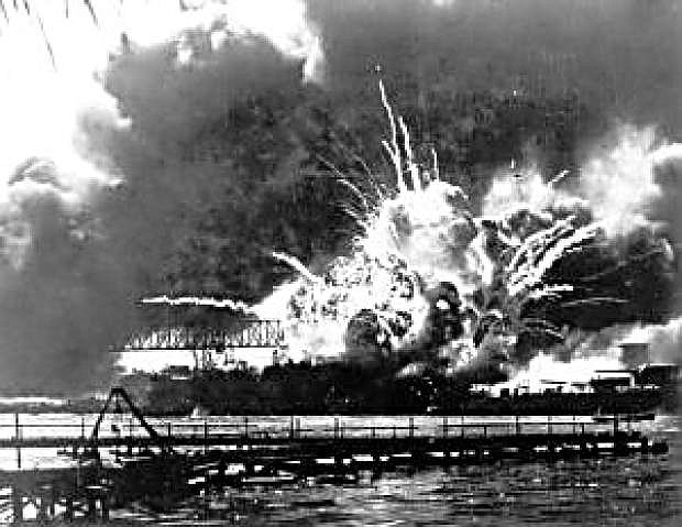 FILE - In this Dec. 7, 1941 file photo, the destroyer USS Shaw explodes after being hit by bombs during the Japanese surprise attack on Pearl Harbor, Hawaii. Saturday marks the 72nd anniversary of the attack that brought the United States into World War II.