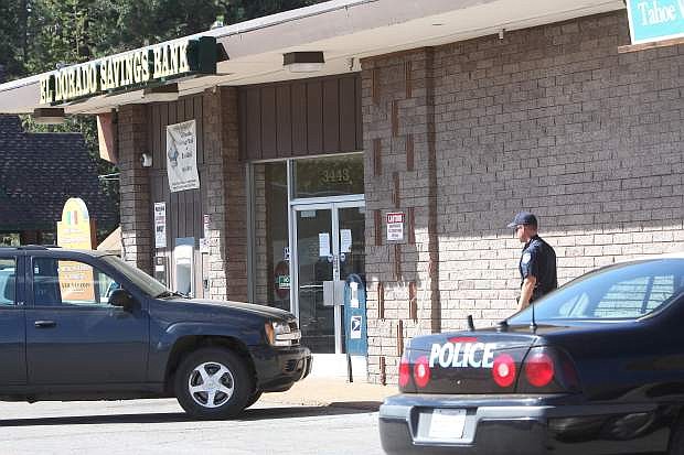 Police officers arrived shortly after a bank robbery was reported at 9:39 a.m. Wednesday at El Dorado Savings Bank, 3443 Lake Tahoe Blvd.