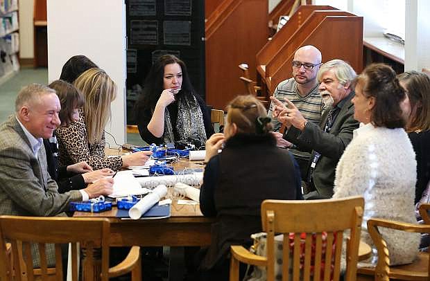 Nevada archivist Jeff Kintop, right center, talks to librarians from the Republic of Belarus during their tour the Nevada State Library, Archives and Public Records in Carson City, Nev. on Friday, Jan. 27, 2017. The group is traveling the United States as part of a three-week, multi-state tour to learn about the educational, social and economic impact of public libraries in American society. Photo by Cathleen Allison/Nevada Photo Source