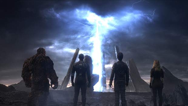 This photo provided by courtesy Twentieth Century Fox shows, The Thing, from left, Michael B. Jordan as Johnny Storm, Miles Teller as Dr. Reed Richards, and Kate Mara as Sue Storm, in a scene from the film, &quot;Fantastic Four.&quot; The movie releases in U.S. theaters on Friday, Aug. 7, 2015. (Twentieth Century Fox via AP)